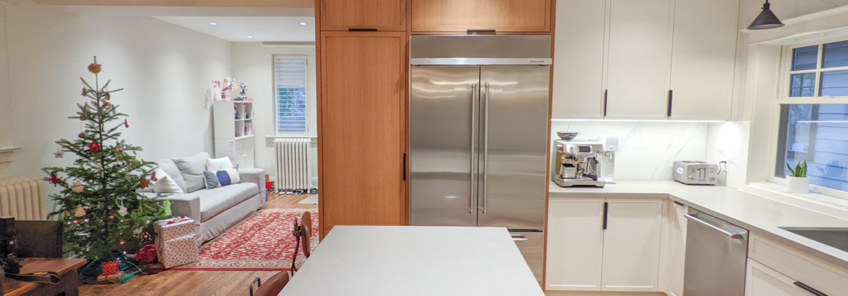 Toronto kitchen renovation, wood cabinets, white countertop