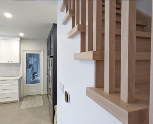 Toronto home renovation, wood stairs, railings and new kitchen