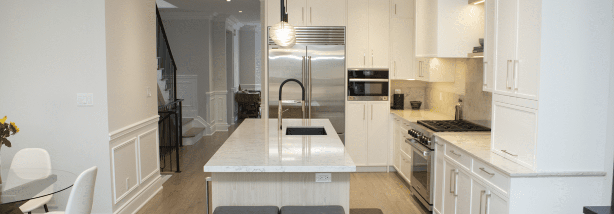 Toronto kitchen renovation with white countertops and white cupboards