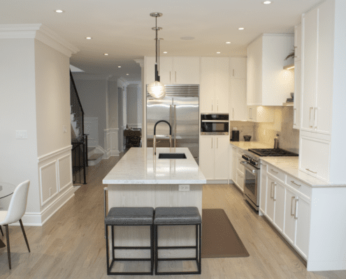 Toronto kitchen renovation with white countertops and white cupboards
