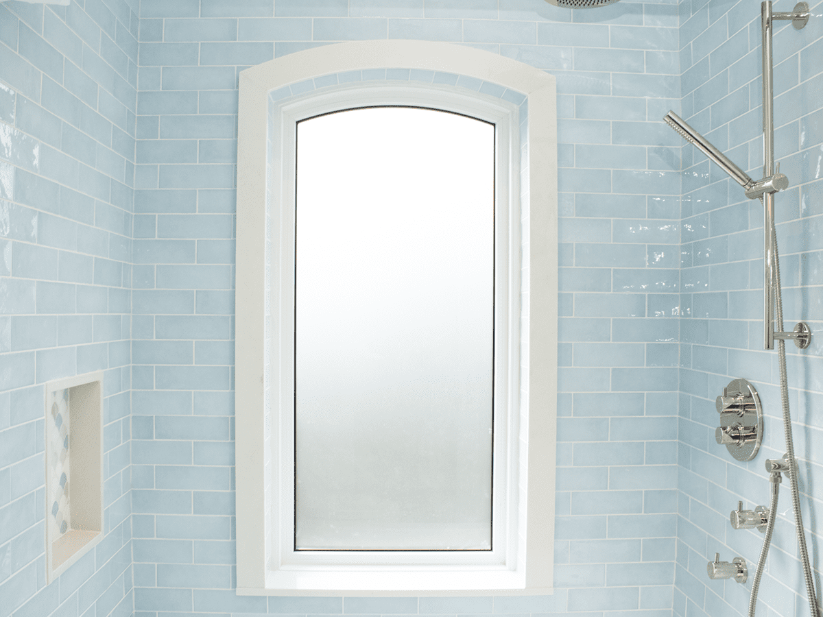 Toronto washroom renovation, blue tiled shower and window